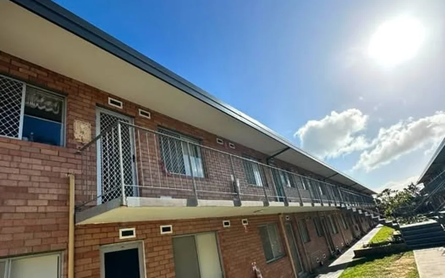 Unit block with newly installed custom fascia, gutters and eaves