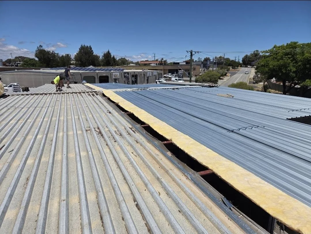 Commercial roof part way through re-sheeting
