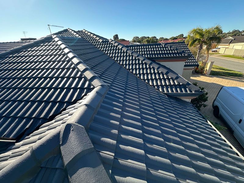 Overflow Group crew completing a roof restoration